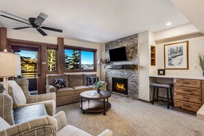 Living room with wood-burning fireplace