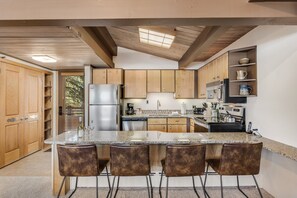 Full kitchen with bar seating