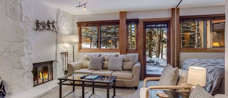 Living room with wood-burning fireplace