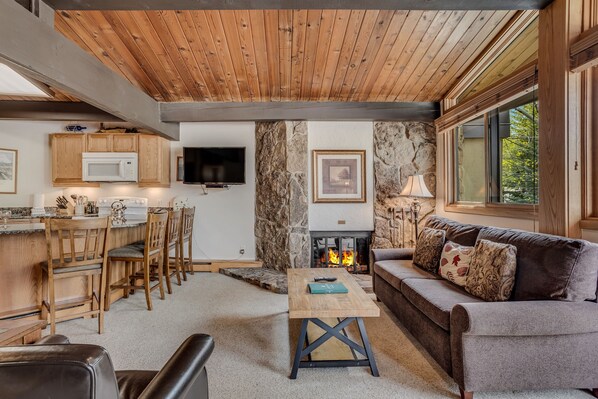 Living room with wood-burning fireplace