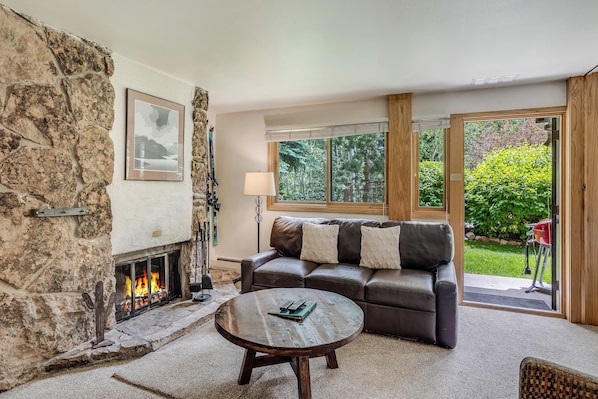 Living room with wood-burning fireplace