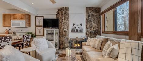 Living room with wood-burning fireplace