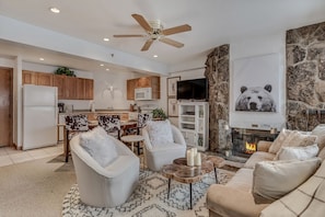 Living room with wood-burning fireplace