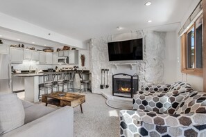 Living area with wood-burning fireplace