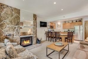 Living room with wood-burning fireplace