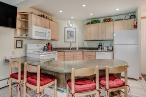 Full kitchen with counter seating