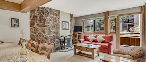 Living room with wood-burning fireplace