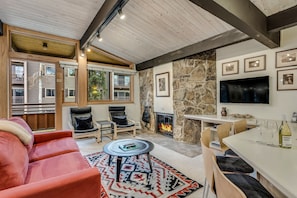 Living room with wood-burning fireplace