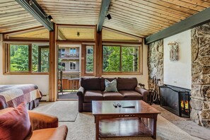 Living room with wood-burning fireplace