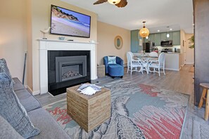 55 in TV in living room fireplace perfect for a romantic getaway.