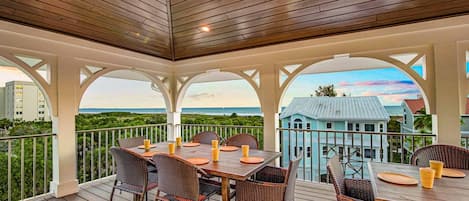 Enjoy dinner on the Balcony with Gulf and Sunset Views