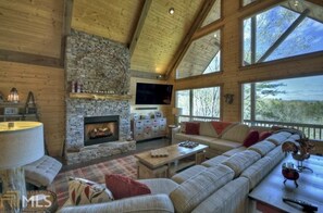 Gas fireplace and large sectional make this a cozy space