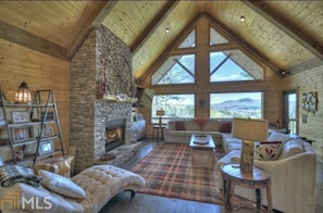 Gorgeous mountain views out the large windows in the living room