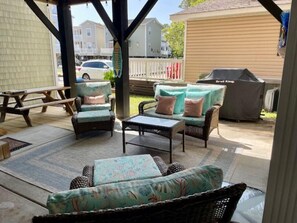 Under home entertaining area with tv and bar