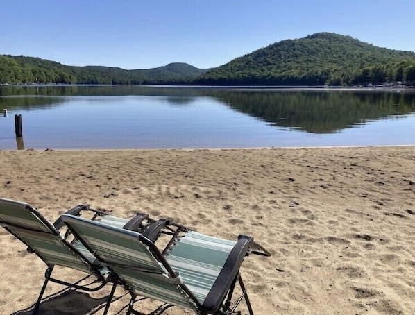 Beach with lounge chairs 