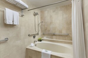 Full bathroom with a shower. Basic toiletries and towels are provided