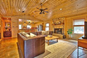 Upscale living room with high ceilings
