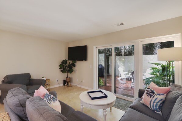 Walk out to private courtyard from living room.