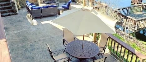 Patio with Beautiful Stone Fireplace and Outdoor Dining Table 