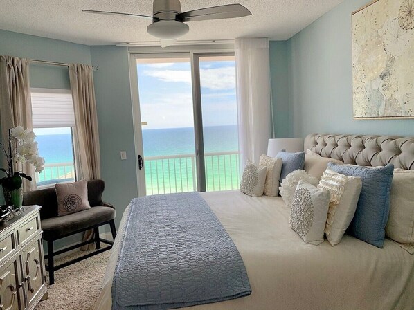 Main suite with serene ocean views and balcony access 