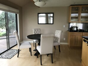 Dining area overlooking a pond
