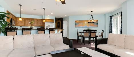 Living room, ceiling fan, TV, spacious sofas