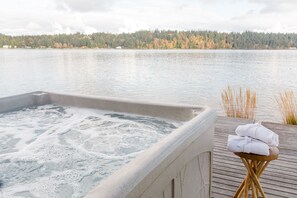 Experience the sound of waves and watch wildlife from the private hot tub.