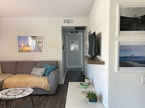 Looking from the living room down the hallway towards the two bedrooms
