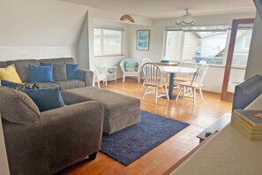 Couch area looking into dining room.