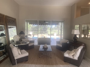 Front entry room with beautiful view of pool & golf course
