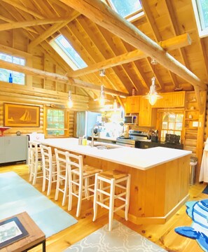 Clean quarts countertop provides open space to eat or just sit around, 6 chairs