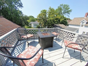 Deck is cozy with a fire pit - perfect for relaxing days or nights.