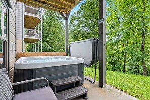 Hot Tub on Lower Level Porch that's Right Outside Indoor Pool Area