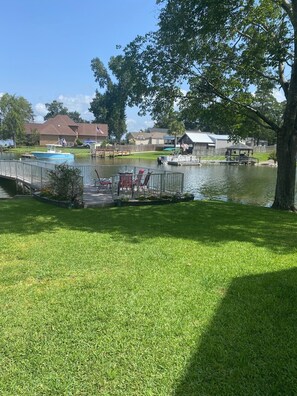 View of the quiet cove which allows for entry into the water from the yard.