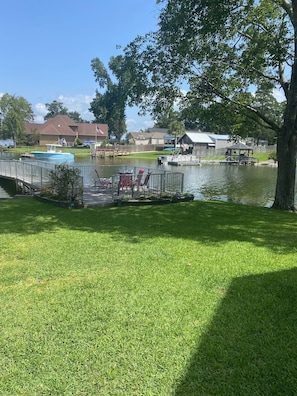 View of the quiet cove which allows for entry into the water from the yard.