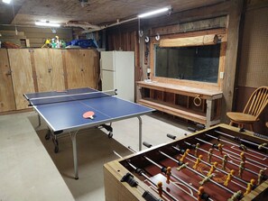 Game Room with foosball, ping pong and dart board!