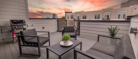 Private rooftop patio with BBQ grill, lounge area, and incredible views of downtown.