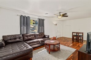 Large couch and sitting area to relax or play a game.