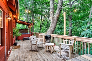Whether you're looking forward to grilling or simply just relaxing under the trees, you can have it all!
