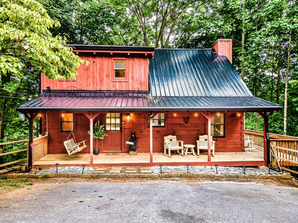 Charming and inviting front porch welcomes all of our guests for a relaxing stay