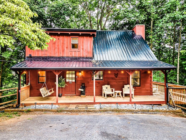 Charming and inviting front porch welcomes all of our guests for a relaxing stay