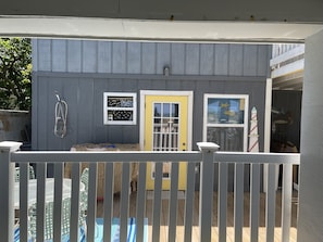 View of front of Cottage with privacy fence