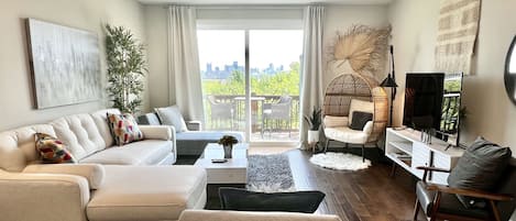 Living Room with city view-queen sleeper sofa & 2 sleeping chairs