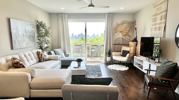 Living Room with city view-queen sleeper sofa & 2 sleeping chairs