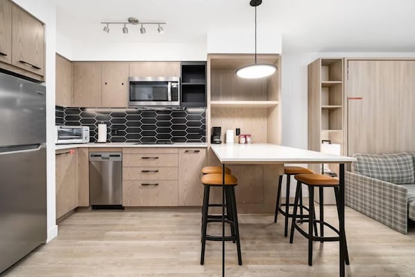 Prepare dinner at 'home' in this open kitchen