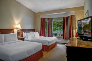 The second bedroom has 2 queen-sized beds