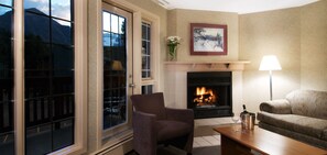Lounge by the cozy fireplace after a day on the slopes