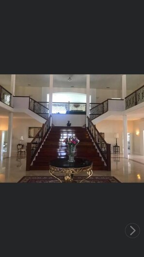 Grand foyer with 35 ft high ceiling 
36 feet by 36 feet