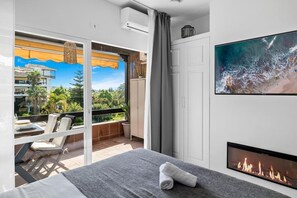 Bright and comfortable bedroom with direct access to the balcony to enjoy beautiful views