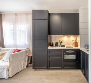 Modern kitchen, appointed with everything you need to prepare a great meal.